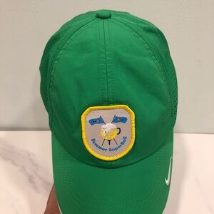 Nike Green Cap with Yellow-Trimmed Patch and White Swoosh
